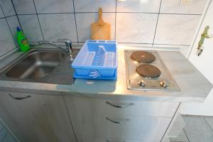 Kuchyň nebo kuchyňský kout v ubytování Apartments Andro + 16 fotografií