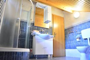 Kúpeľňa v ubytovaní Apartments Bakuk + 15 fotografií