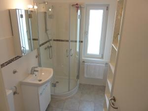 a bathroom with a shower and a sink at meine-nordsee-fewo in Esens +19 photos