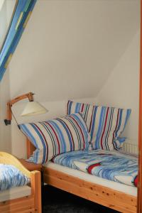 Кровать или кровати в номере Zur Schatztruhe