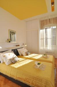 Posteľ alebo postele v izbe v ubytovaní Apartment Barbara Centrum