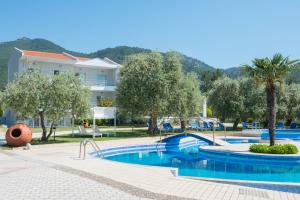 The swimming pool at or close to Akti Belvedere Color & Essence