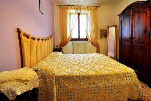 A bed or beds in a room at Agriturismo Galanti