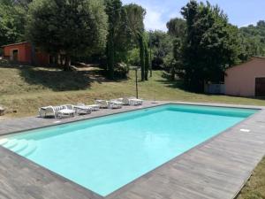 The swimming pool at or close to Podere San Cassiano