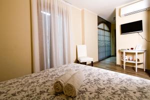 Tempat tidur dalam kamar di Andirivieni Bellagio Guest House