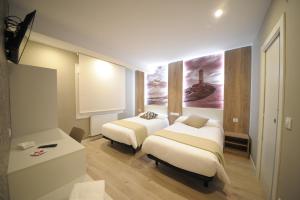 Katil atau katil-katil dalam bilik di Rio Sil Carballo