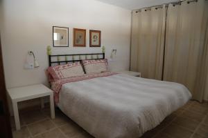 Cama o camas de una habitación en Casa Trillo Apartamentos