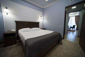 Katil atau katil-katil dalam bilik di Boulevard Hotel