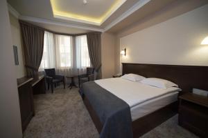 Katil atau katil-katil dalam bilik di Boulevard Hotel