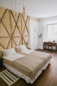 Ένα ή περισσότερα κρεβάτια σε δωμάτιο στο Asul B&B +101 φωτογραφίες