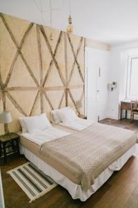 Ένα ή περισσότερα κρεβάτια σε δωμάτιο στο Asul B&B