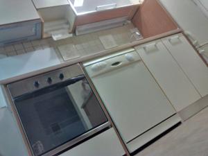 Кухня або міні-кухня у Apartment Gold & Gray