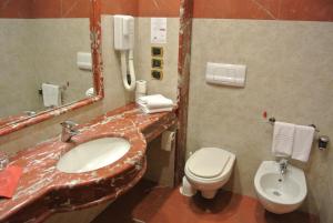 Koupelna v ubytování Grand Hotel la Chiusa di Chietri