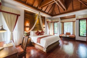 Postel nebo postele na pokoji v ubytování Muang Samui Spa Resort - SHA Extra Plus + 37 fotografií