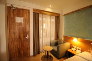 Postel nebo postele na pokoji v ubytování Liberta Hotel Jimbaran