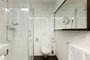 Koupelna v ubytování Hotel Garni Tannleger B&B