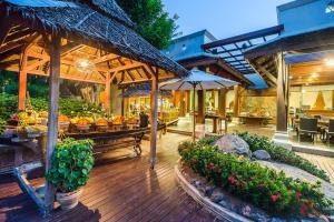 Muang Samui Spa Resort - SHA Extra Plus 레스토랑 또는 맛집
