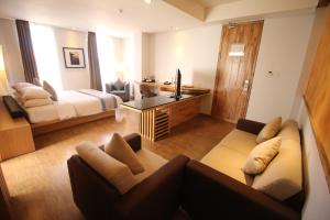 Postel nebo postele na pokoji v ubytování Liberta Hotel Jimbaran