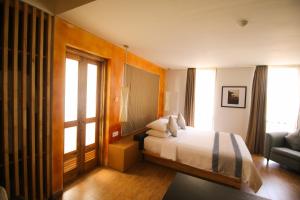 Postel nebo postele na pokoji v ubytování Liberta Hotel Jimbaran
