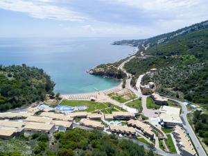an aerial view of a resort next to a body of water at Thassos Grand Resort in Alyki