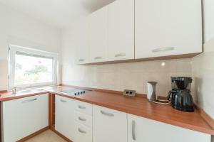 Køkken eller tekøkken på Apartments Brekalo