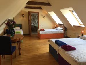 Postel nebo postele na pokoji v ubytování Peahen Residence