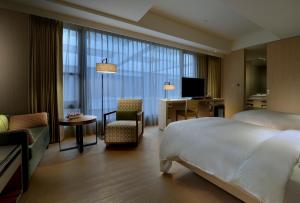 TV a/nebo společenská místnost v ubytování Chihpen Century Hotel