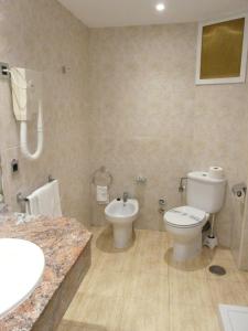 Koupelna v ubytování Hotel Tanit
