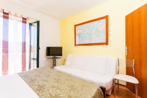Postel nebo postele na pokoji v ubytování Apartments Marija