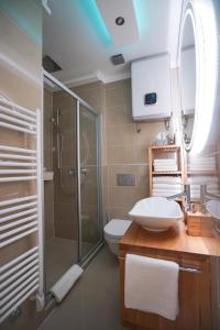 Kúpeľňa v ubytovaní Destino City Apartments + 37 fotografií