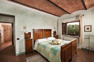 A bed or beds in a room at Agriturismo La Provenca