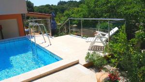 Bazén v ubytování Apartments Simag nebo v jeho okolí