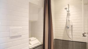 Koupelna v ubytování Intervallo Boutique Hotel + 37 fotografií
