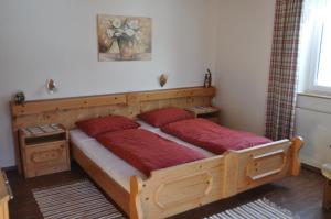 Postel nebo postele na pokoji v ubytování Haus Taumberger