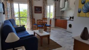 Kuchyňa alebo kuchynka v ubytovaní Apartamentos Saturnos