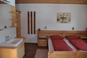 Postel nebo postele na pokoji v ubytování Haus Taumberger