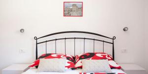 Posteľ alebo postele v izbe v ubytovaní Apartmani Jukic