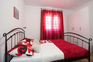 Posteľ alebo postele v izbe v ubytovaní Apartmani Jukic