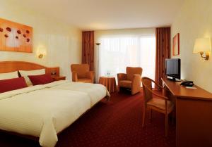 TV a/nebo společenská místnost v ubytování Flair Hotel Werbetal
