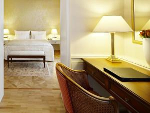 Postel nebo postele na pokoji v ubytování Colombi Hotel
