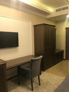 Televisyen dan/atau pusat hiburan di Boulevard Hotel