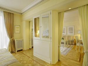 Postel nebo postele na pokoji v ubytování Colombi Hotel