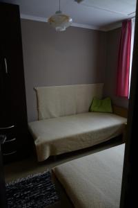 Posteľ alebo postele v izbe v ubytovaní Mesteri Apartman