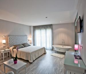 Posteľ alebo postele v izbe v ubytovaní Alix Boutique + 37 fotografií