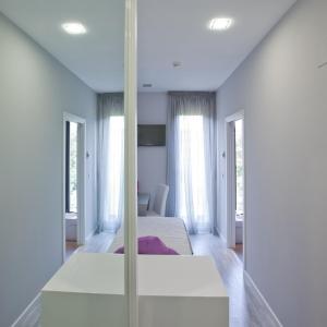 Posteľ alebo postele v izbe v ubytovaní Alix Boutique