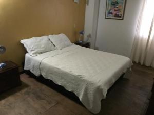 Cama o camas de una habitación en Hospedaje Solymar-Edif. Bay Point apto 604