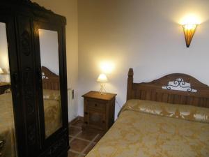 Cama o camas de una habitación en Caballero de Castilla