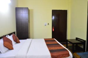 Postel nebo postele na pokoji v ubytování Hotel Amer View