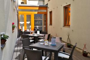 Reštaurácia alebo iné gastronomické zariadenie v ubytovaní Hotel Páv