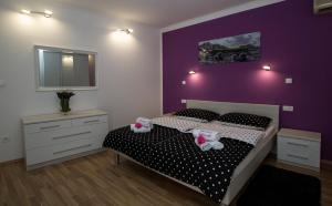 Posteľ alebo postele v izbe v ubytovaní Apartment Sabioncello